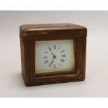 A small French brass carriage clock, 11cm, in leather case