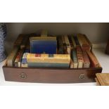 ° ° A small quantity of assorted books including some leather bindings