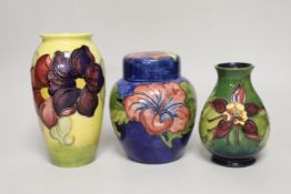 A Moorcroft hibiscus jar and cover, 16cm, an anemone vase and another