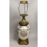 A 19th century ormolu mounted German porcelain table lamp