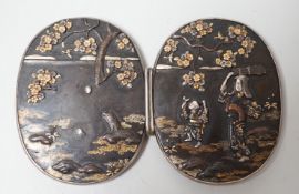 A Japanese Meiji period mixed metal belt buckle