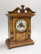 A 19th century Black Forest inlaid walnut mantel clock, 37cm high