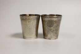 A pair of late 19th/early 20th century Chinese Export white metal beakers, by WK, 56mm, 93 grams.