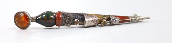 A Victorian white metal, gem and Scottish hardstone set dirk brooch, 10.6cm.