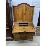 A 19th century Continental walnut bureau cabinet, width 105cm, depth 57cm, height 188cm