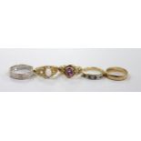 Four assorted modern 9ct gold and gem set dress rings, including single stone amethyst and singe