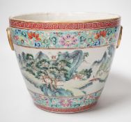 A 19th century Chinese famille rose ‘landscape’ planter, 15cm tall, rim crack