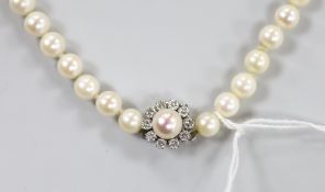 A modern single strand cultured pearl necklace, with diamond and cultured pearl set 750 white