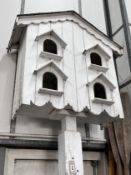 A painted wood dovecote, height 307cm