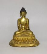 A Sino-Tibetan gilt bronze figure of Buddha Shakuamuni, 16cm