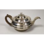 A George III silver squat circular teapot, George Burrows II, London, 1816, gross weight 20.6oz.