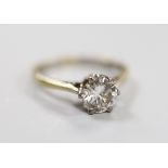 An 18ct white gold and solitaire diamond ring, size M/N, gross weight 2.9 grams, the stone
