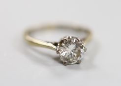 An 18ct white gold and solitaire diamond ring, size M/N, gross weight 2.9 grams, the stone