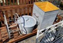 A vintage galvanised square grain bin, height 55cm, a circular lidded container and a hose reel