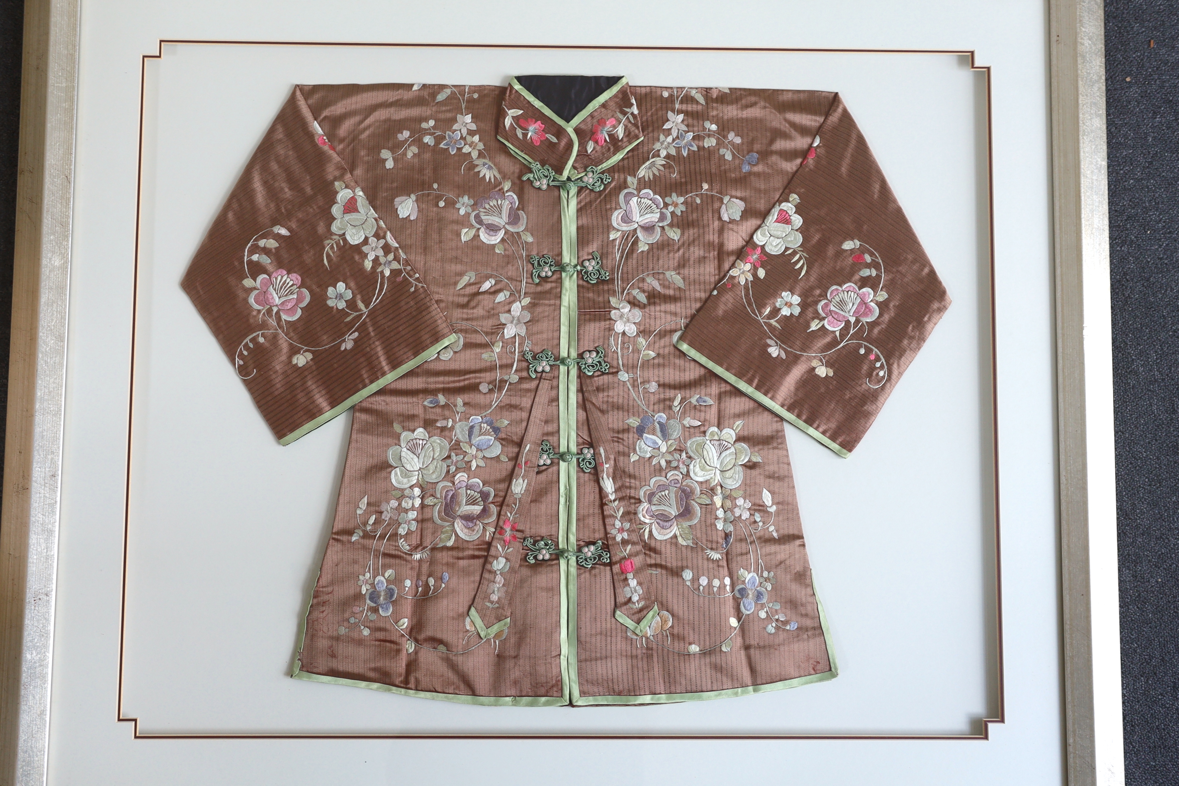 An early 20th century Chinese brown silk robe, with pastel multi-coloured all over embroidered - Image 2 of 2
