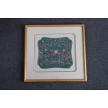 A late 19th early 20th century Chinese incised embroidery, decorated with symbolic animal, bird