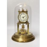 An early 20th century clock under glass dome, 29cm