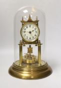 An early 20th century clock under glass dome, 29cm