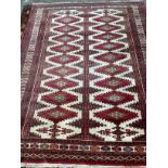 A Bokhara ivory ground rug, 217 x 168cm