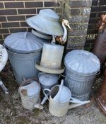 A quantity of galvanised bins, watering cans, feeder etc