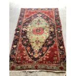A North West Persian rug, 213 x 136cm