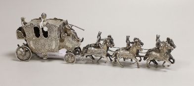 An Edwardian Hanau silver model of a coaching procession, import marks for London, 1901, length