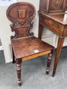 Two Victorian mahogany hall chairs
