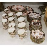 A collection of Royal Crown Derby tea and coffee wares to include a tray