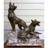 After Louis-Albert Carvin (1875–1951). A spelter Alsatian group on stepped marble base, 53cm tall