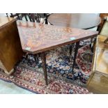 A 19th century Dutch mahogany and floral marquetry inlaid walnut folding card table, width 104cm,