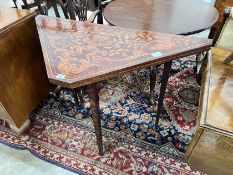 A 19th century Dutch mahogany and floral marquetry inlaid walnut folding card table, width 104cm,