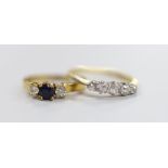 An 18ct, plat and graduated five stone diamond set half hoop ring, size N/O, gross weight 2.1