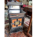 A late Victorian aesthetic movement ebonised amboyna side cabinet, width 55cm, depth 40cm, height