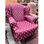 A Victorian style upholstered armchair, width 90cm, height 100cm