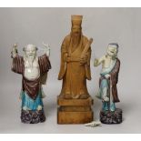 Two Chinese wucai glazed figures of immortals, Republic period, and a Chinese carved boxwood