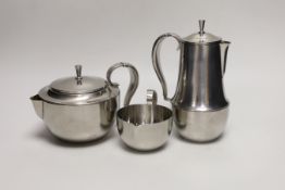 A Georg Jensen stainless steel three piece teaset