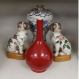A Chinese blue and white Meiping, a copper red glaze vase and a pair of dog figures, tallest 30cm