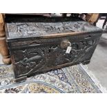 A Chinese carved camphorwood trunk, length 96cm, depth 48cm, height 50cm