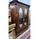 An Edwardian satinwood banded mahogany mirrored door wardrobe, width 162cm, depth 58cm, height