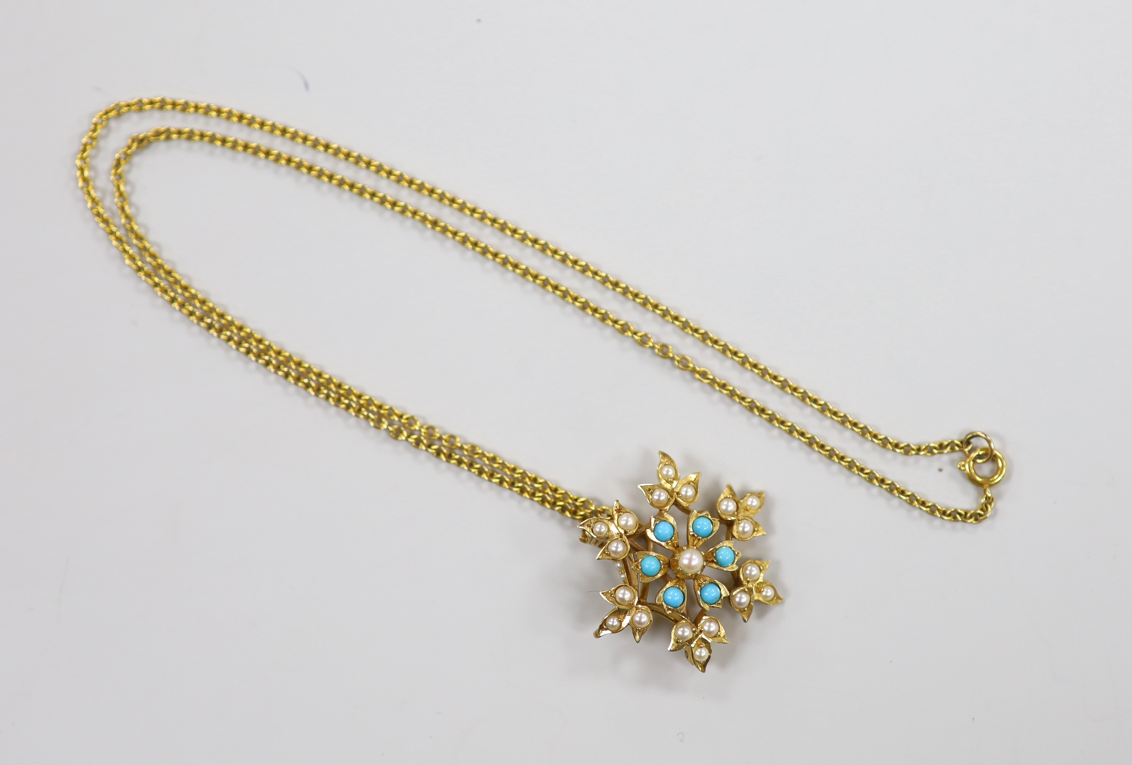 An Edwardian yellow metal, turquoise and seed pearl set flower head pendant brooch, overall 36mm, on - Image 2 of 3