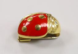 An 18ct gold, enamel and diamond chip set novelty clip brooch, in the form of a ladybird, by
