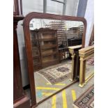 A late Victorian mahogany overmantel mirror, width 140cm, height 143cm