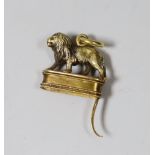 A late 19th century yellow metal scent bottle mount?, modelled as a lion en passant, height 18mm.