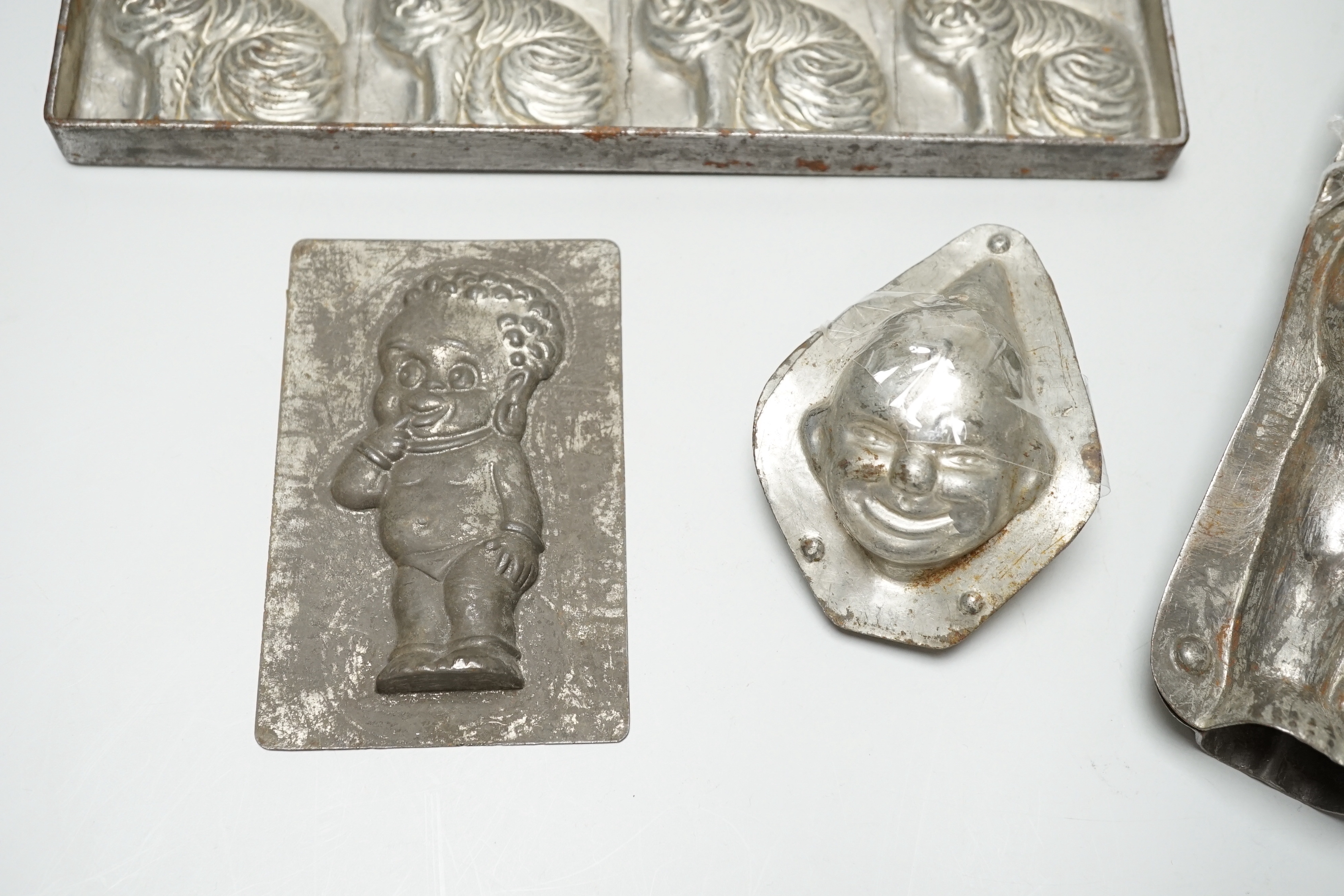 Four chocolate mould tins: a cat, a kewpie and two others - Image 13 of 15