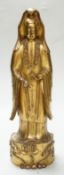 A Chinese or Japanese gold lacquered wood model of Guanyin, Qing dynasty, 32cm