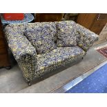 A Victorian upholstered drop-arm Chesterfield settee, width 170cm, depth 84cm, height 72cm