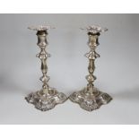 A pair of George V silver mounted candlesticks, with waisted knopped stems, William Hutton & Sons,