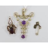 An Edwardian 9ct amethyst and seed pearl set drop pendant, 4cm, gross weight 1.7 grams and a gilt