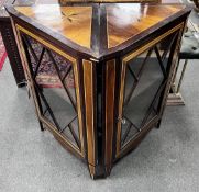 A pair of 19th century Dutch inlaid and stained beech corner cabinets, each set with a Maltese Cross