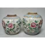 Two graduated 19th century Chinese famille rose ‘phoenix and peony’ ovoid jars, tallest 22cm
